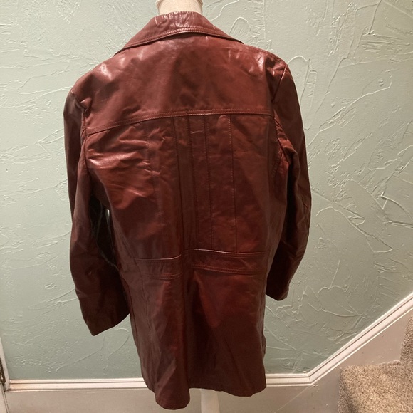 Montgomery Ward
Vintage brown/red leather coat
44L - Picture 9 of 14